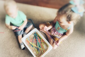 Kids playing with sensory bin